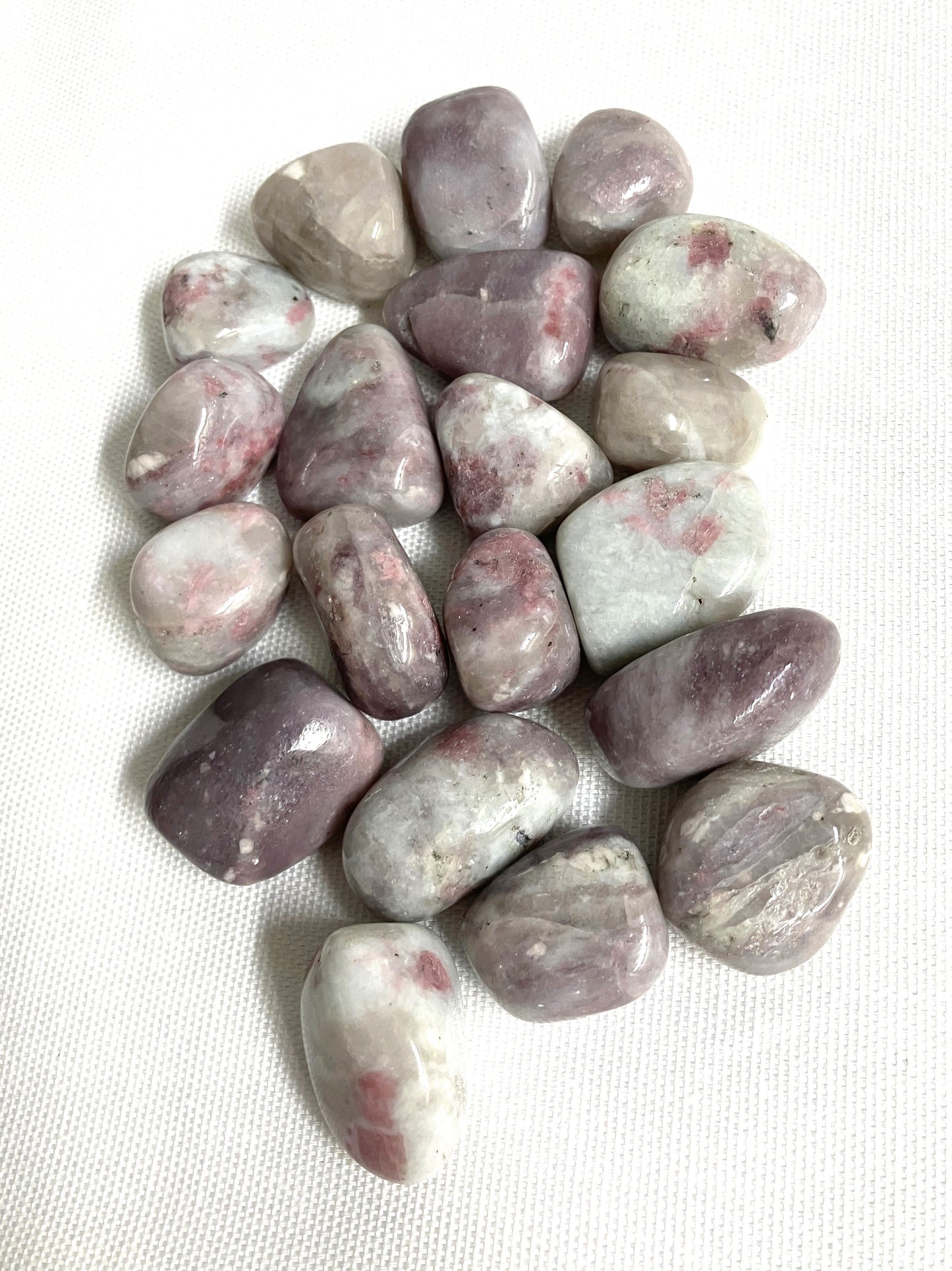 Back view of Pink Tourmaline Crystals on a white background