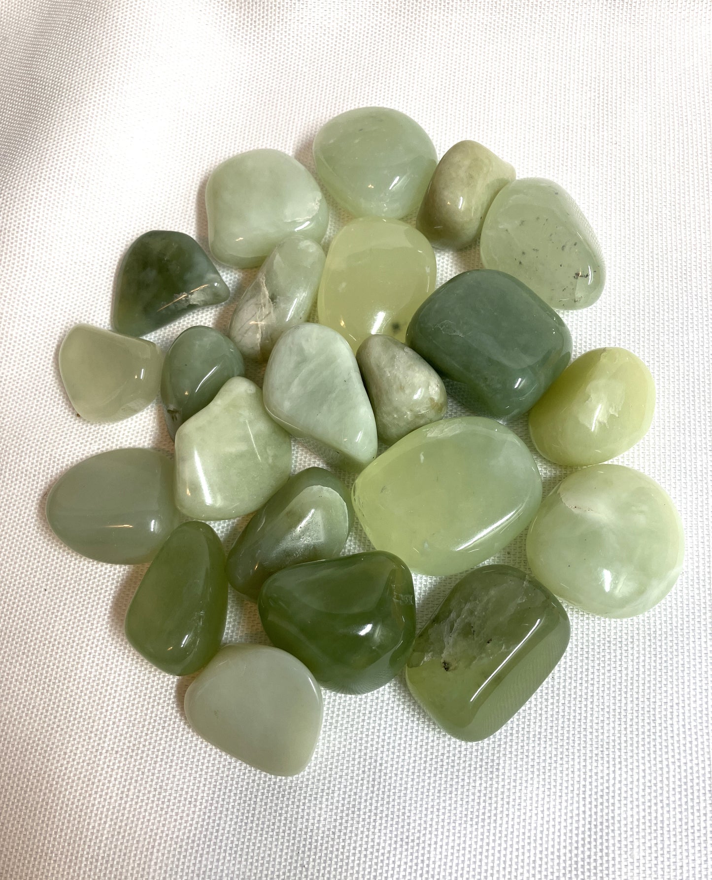 New Jade Crystals shown on a white fabric background View 4