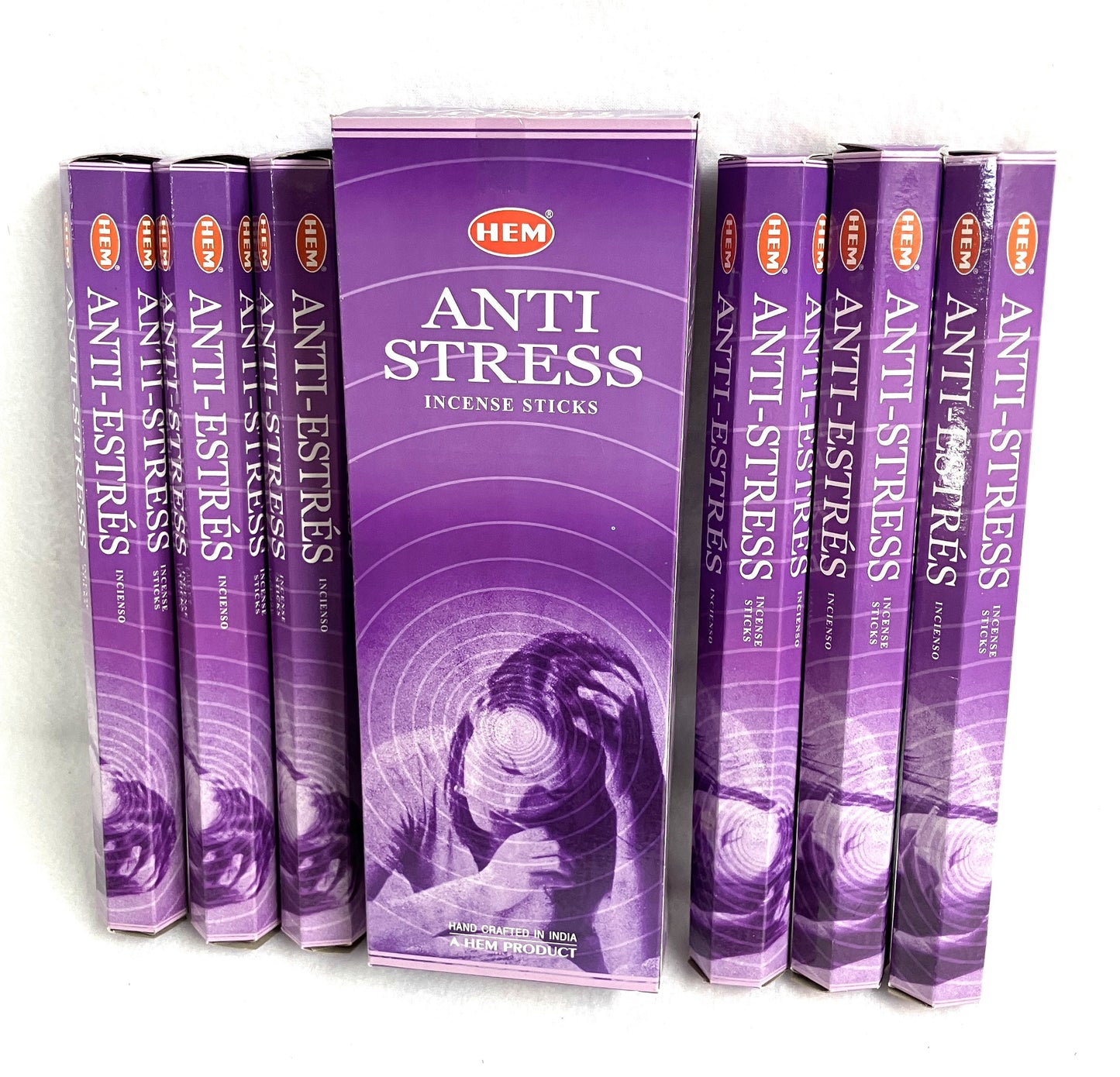 Purple boxes of HEM Anti Stress incense sticks on a white background