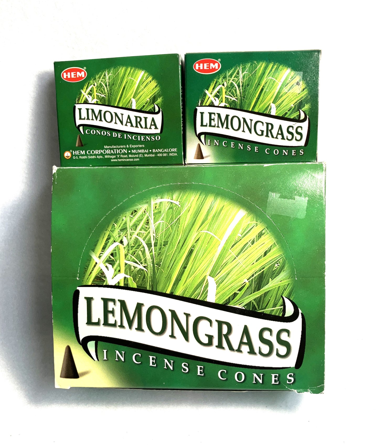 Master carton and two boxes of HEM Lemongrass incense cones shown on a white background