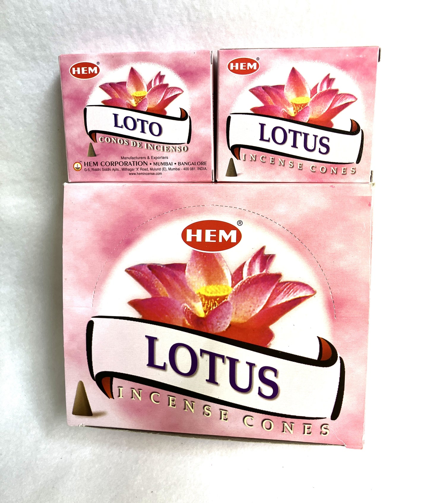 Master carton and two boxes of HEM Lotus Incense Cones shown on a white background
