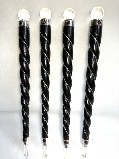 Four Rosewood twisted  Wands with Quartz Orb and Point tips shown on a white background