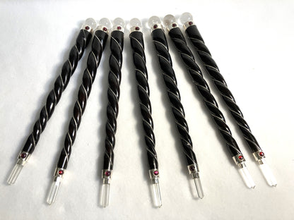 Group of Rosewood Twisted Wands with silver accents and quartz orb and point shown on a white background