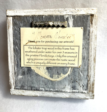 Wooden Lobster Trap frame with lobster trap and descriptive card on a gray background