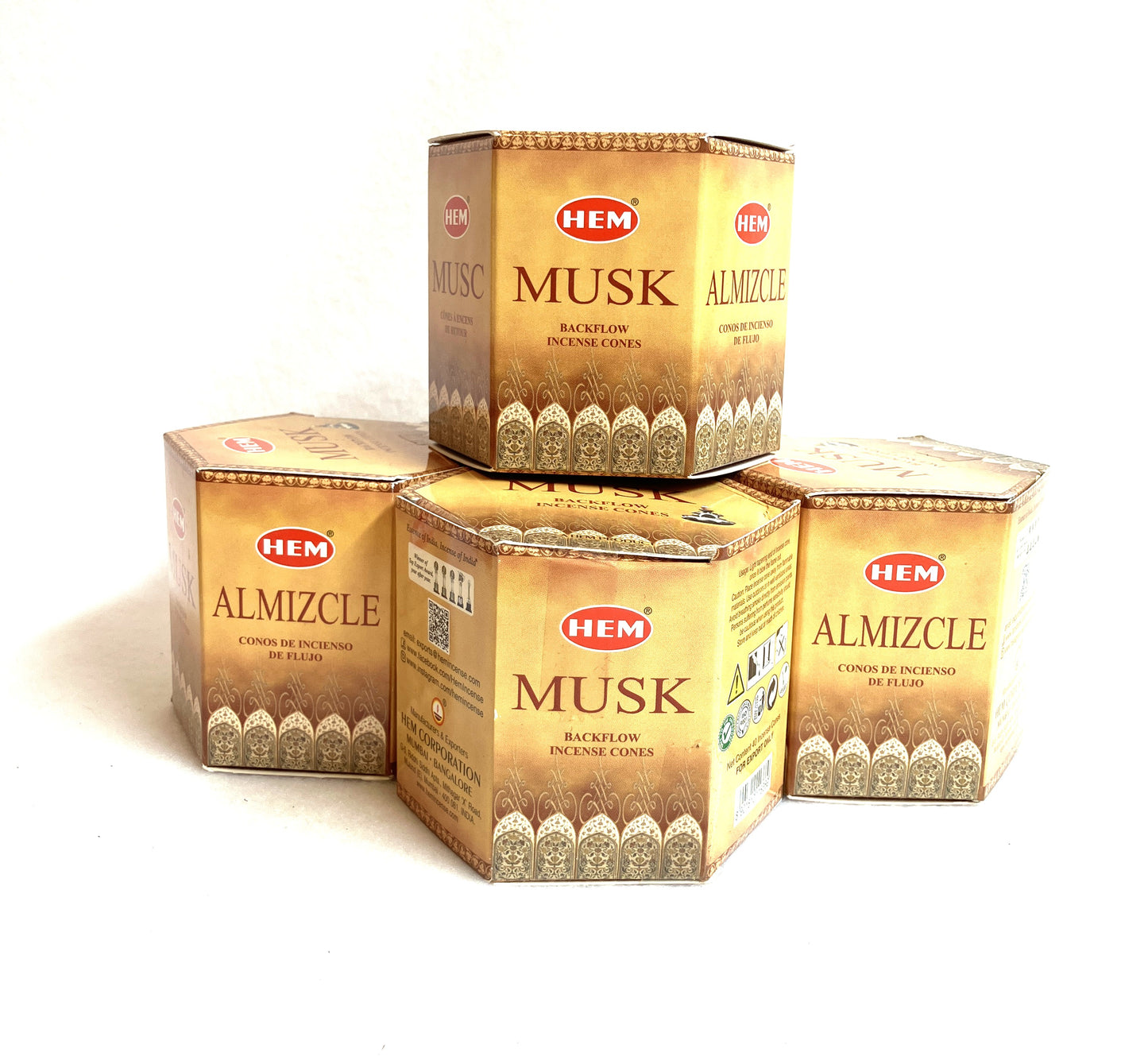 Five boxes of HEM Musk Backflow incense cones on a white background