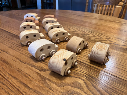 Wooden toy cars on a wooden table