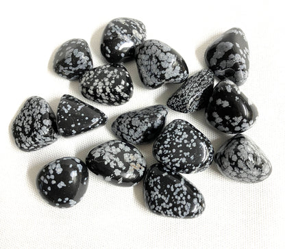 Closeup of Snowflake Obsidian Crystals on a white background