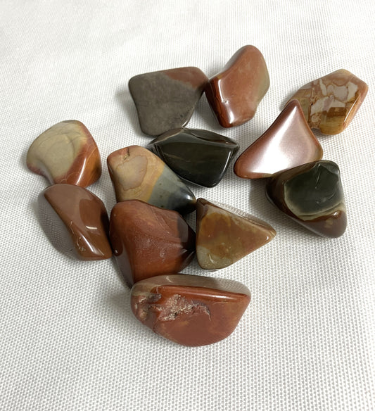 View one of Desert Jasper Crystal AKA Polychrome Jasper on a white fabric background