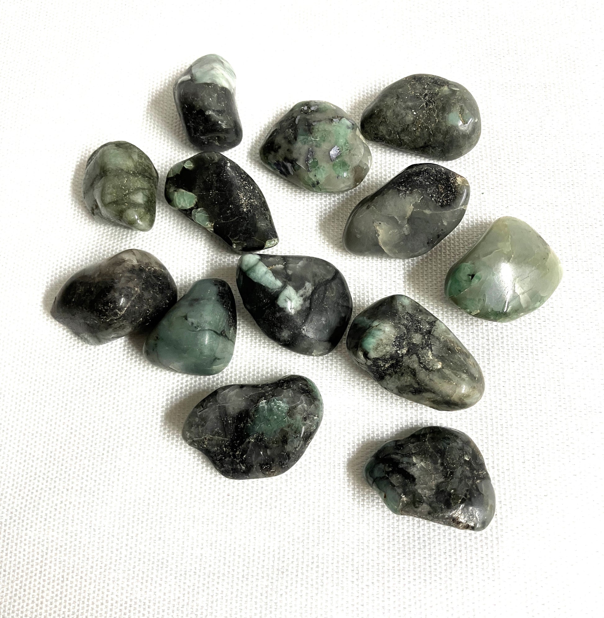 Collection of Emerald Crystals on a white background