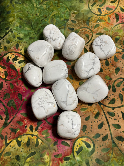 Howlite Crystals showing the nice veining on a patterned fabric background