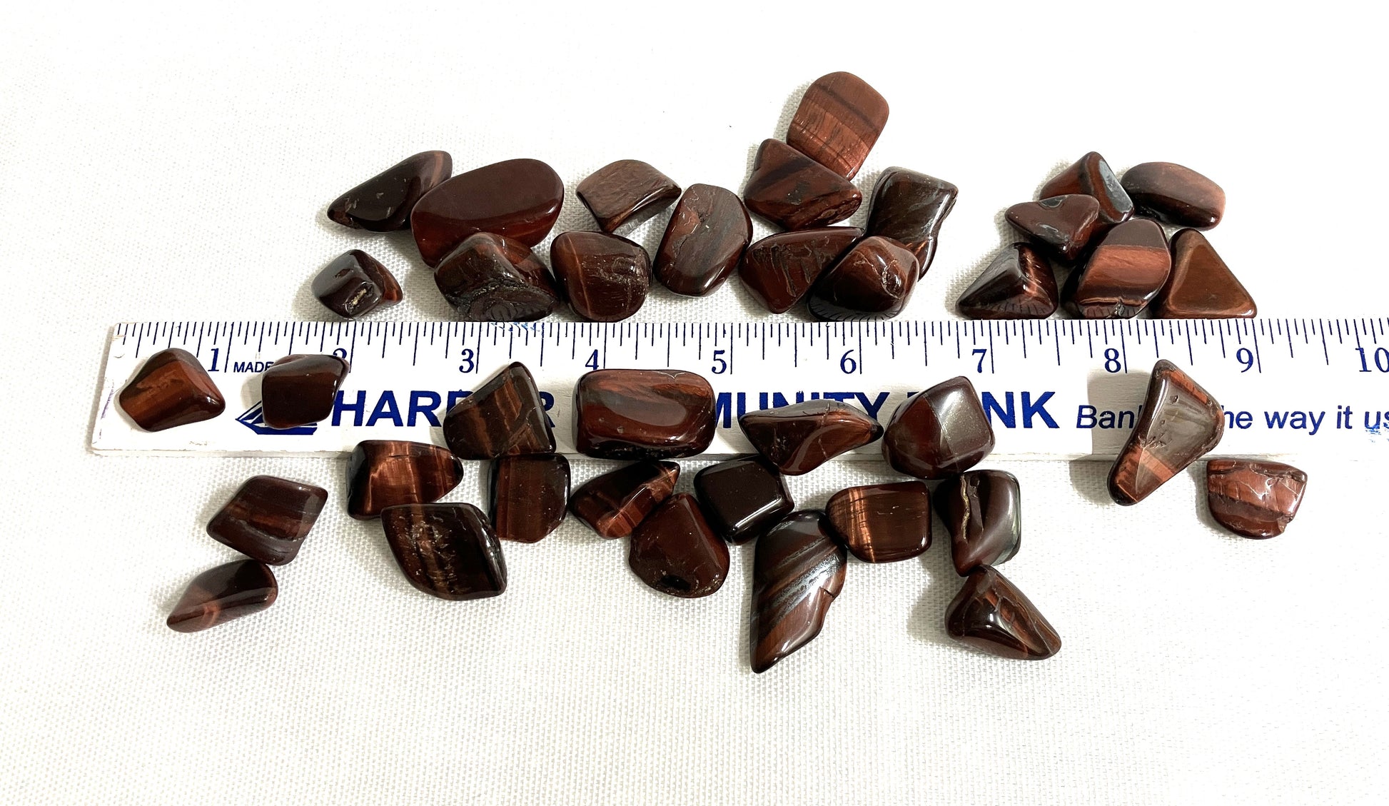 Red Tiger Eye grouping shown with a scale to indicate sizes