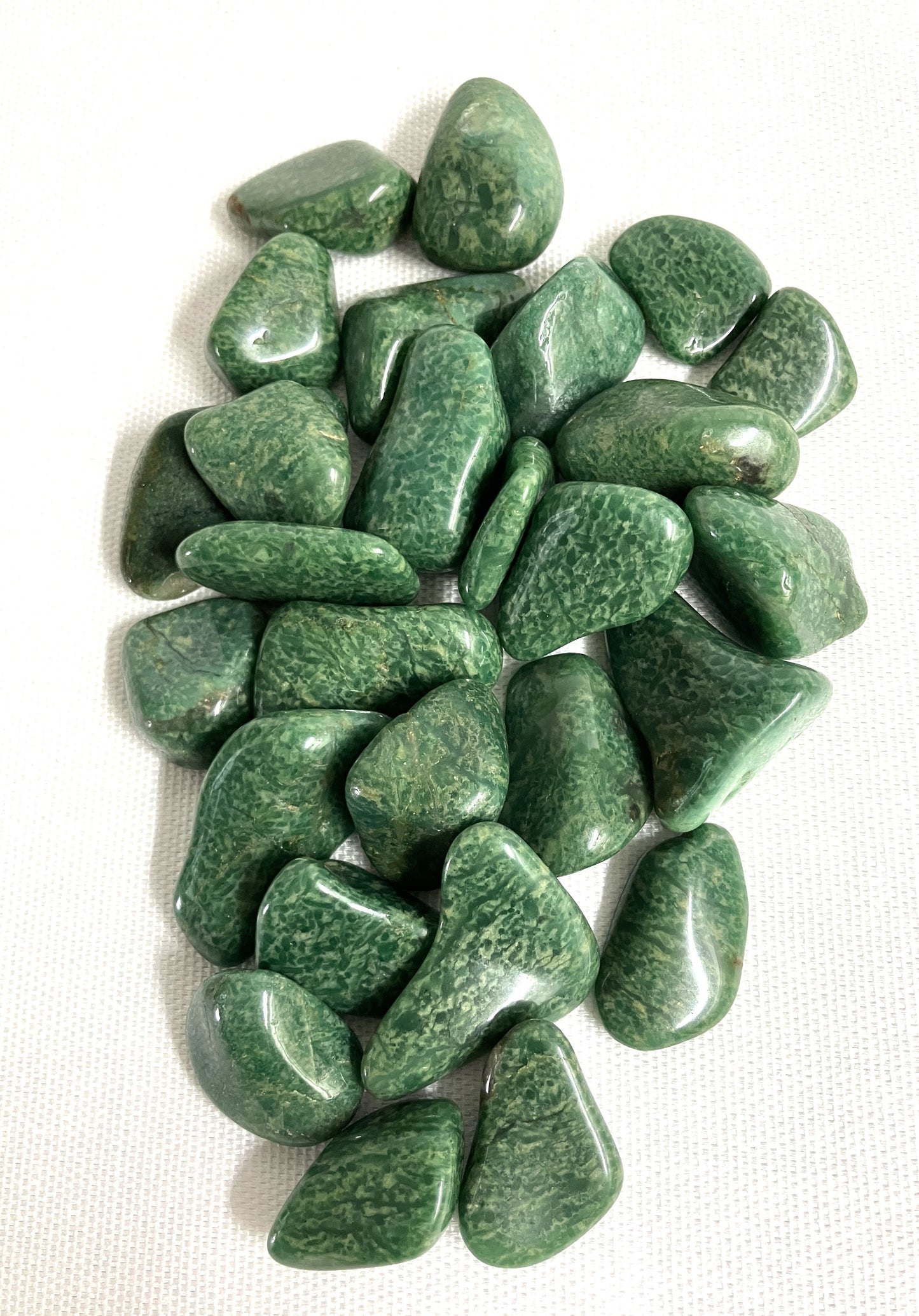 Closeup view of Verde Quartz Crystals on a white background