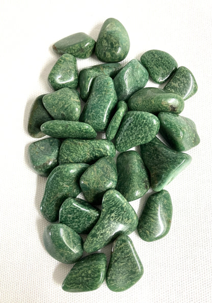 Closeup view of Verde Quartz Crystals on a white background