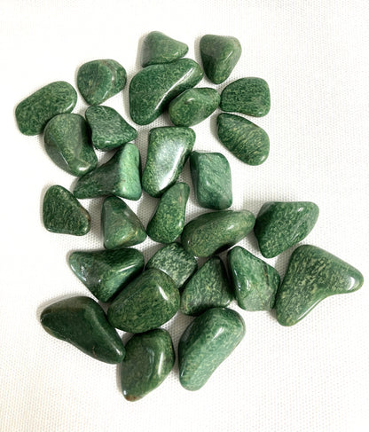 Front side of Verde Quartz Crystals on a white background