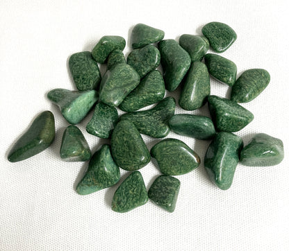 Back side of Verde Quartz Crystals on a white background