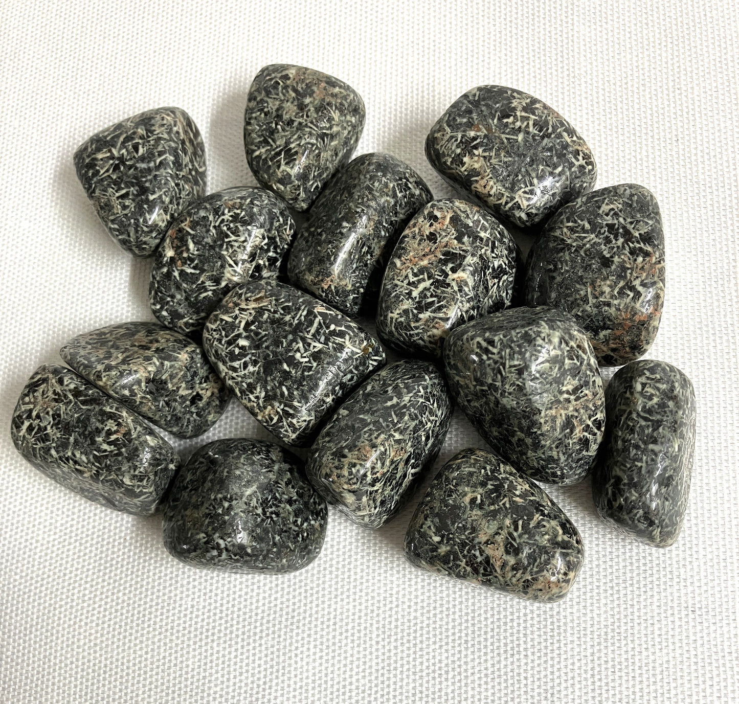 Closeup of Christmas Flower Jasper Crystals on a white fabric background