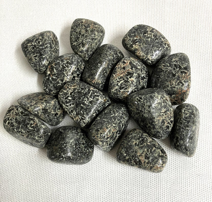 Closeup of Christmas Flower Jasper Crystals on a white fabric background