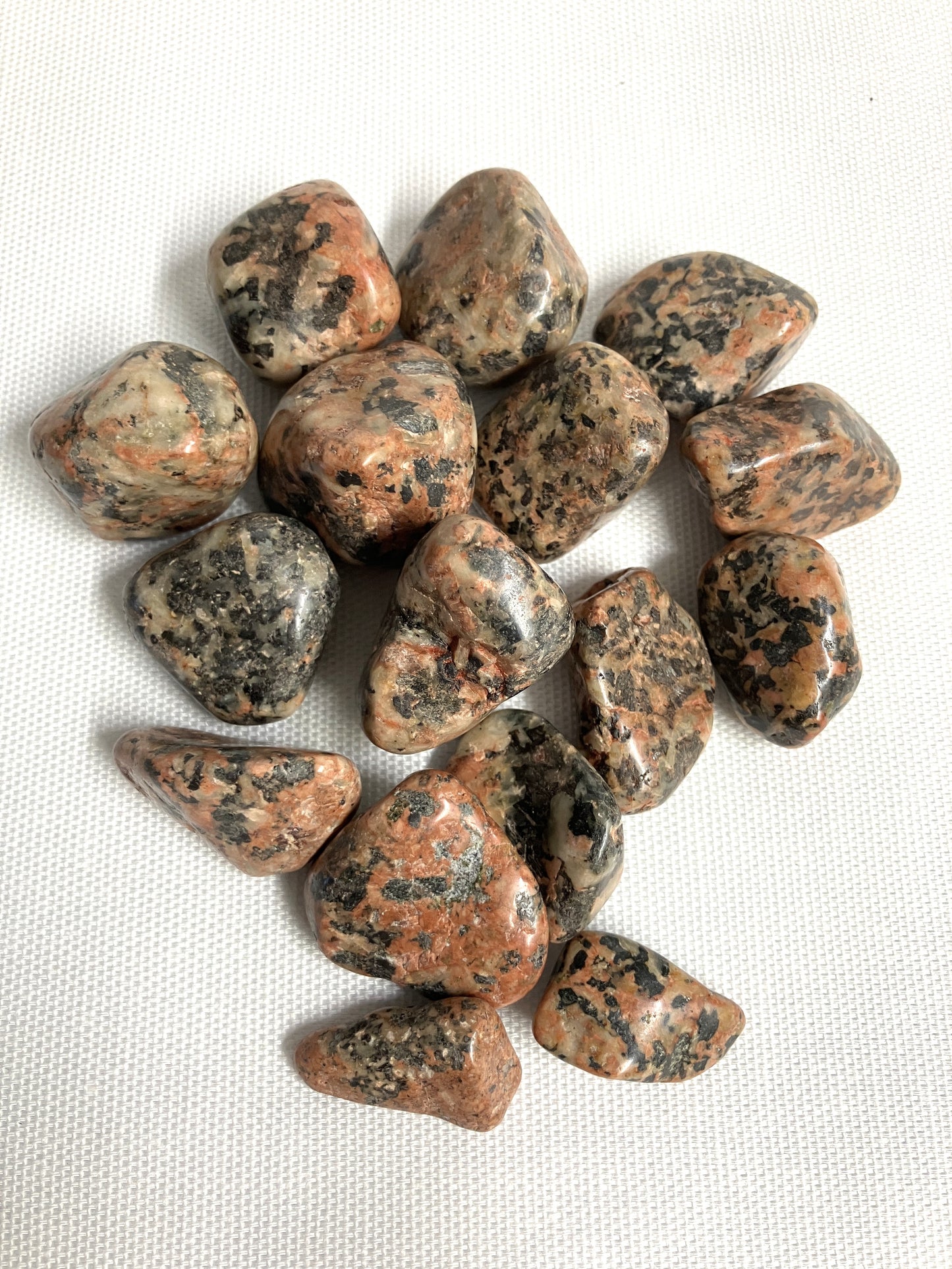 Back view of Orthoclase Crystals on a white fabric background