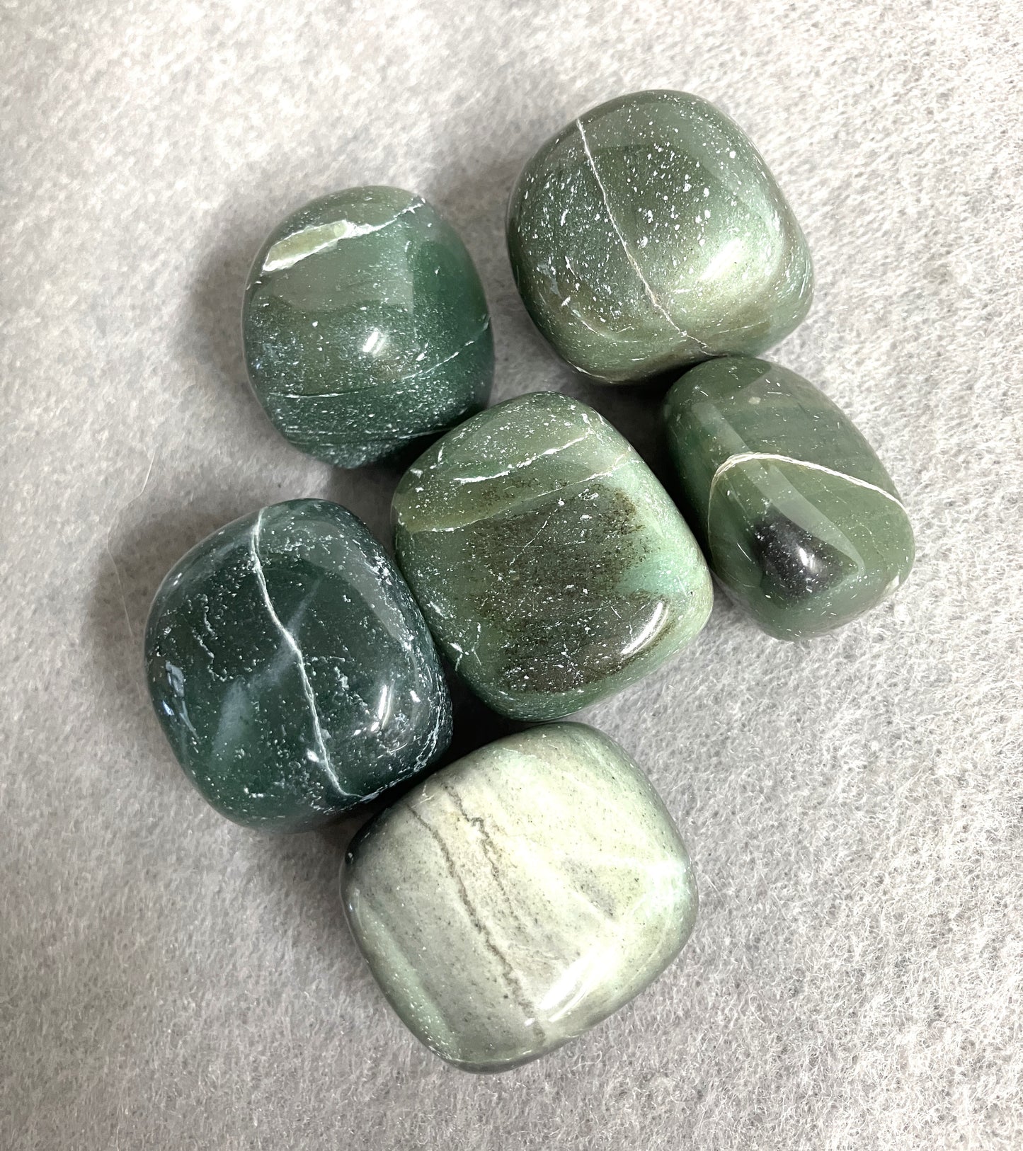 Showing a Group of Bowenite Crystals displaying the various pattens front