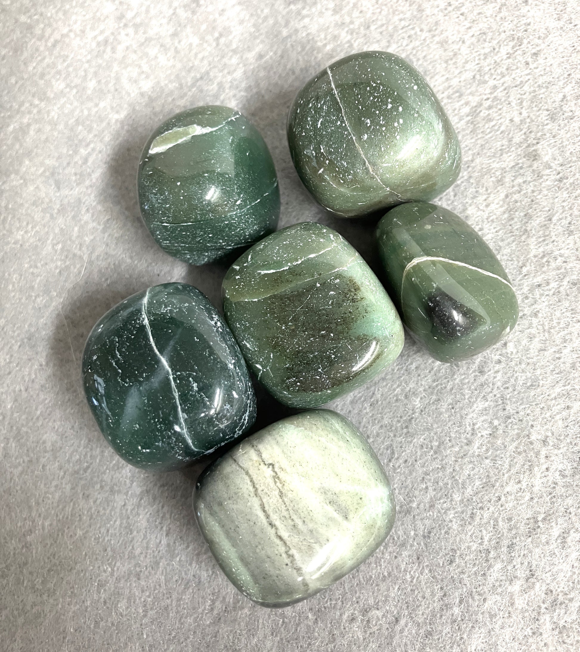 Showing a Group of Bowenite Crystals displaying the various pattens front