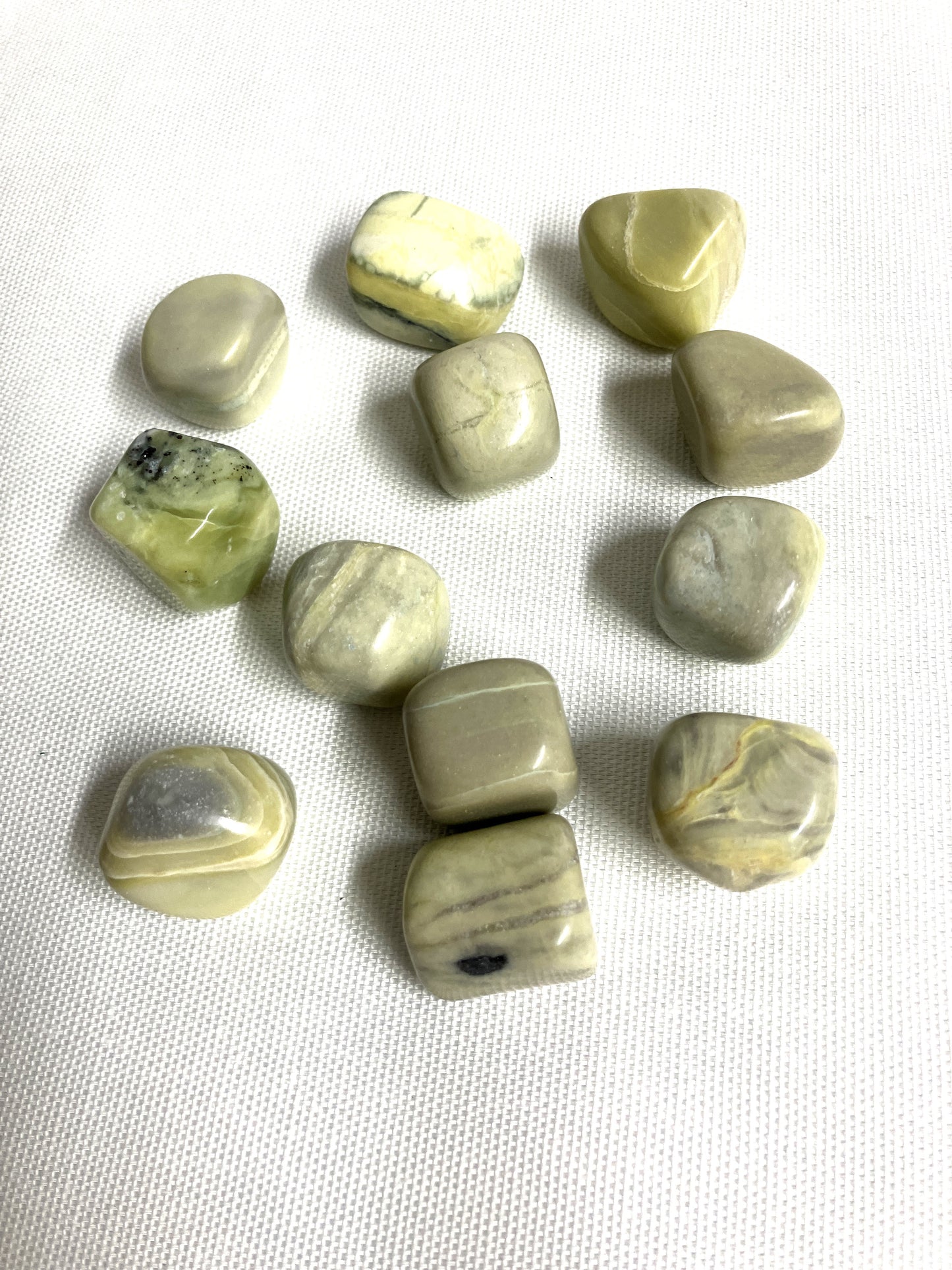 Infinite Crystals showing the color variants and patterns on a white fabric background