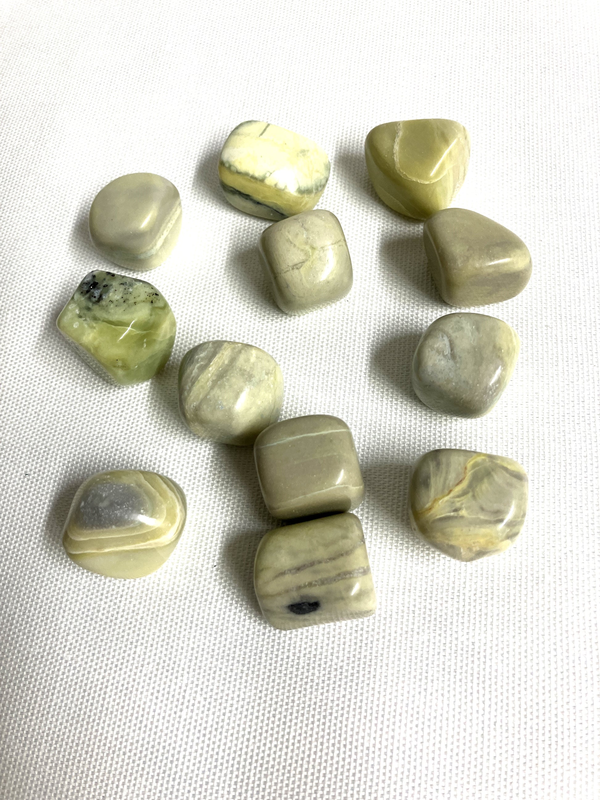 Infinite Crystals showing the color variants and patterns on a white fabric background