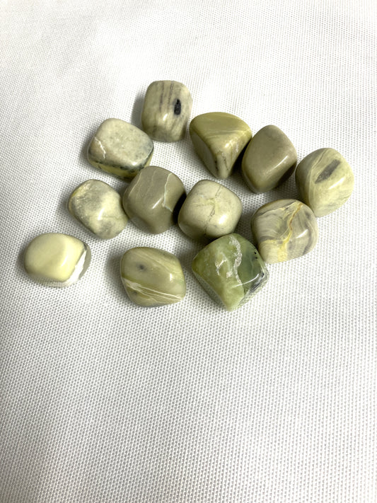 Group of Infinite Crystals on a white fabric background