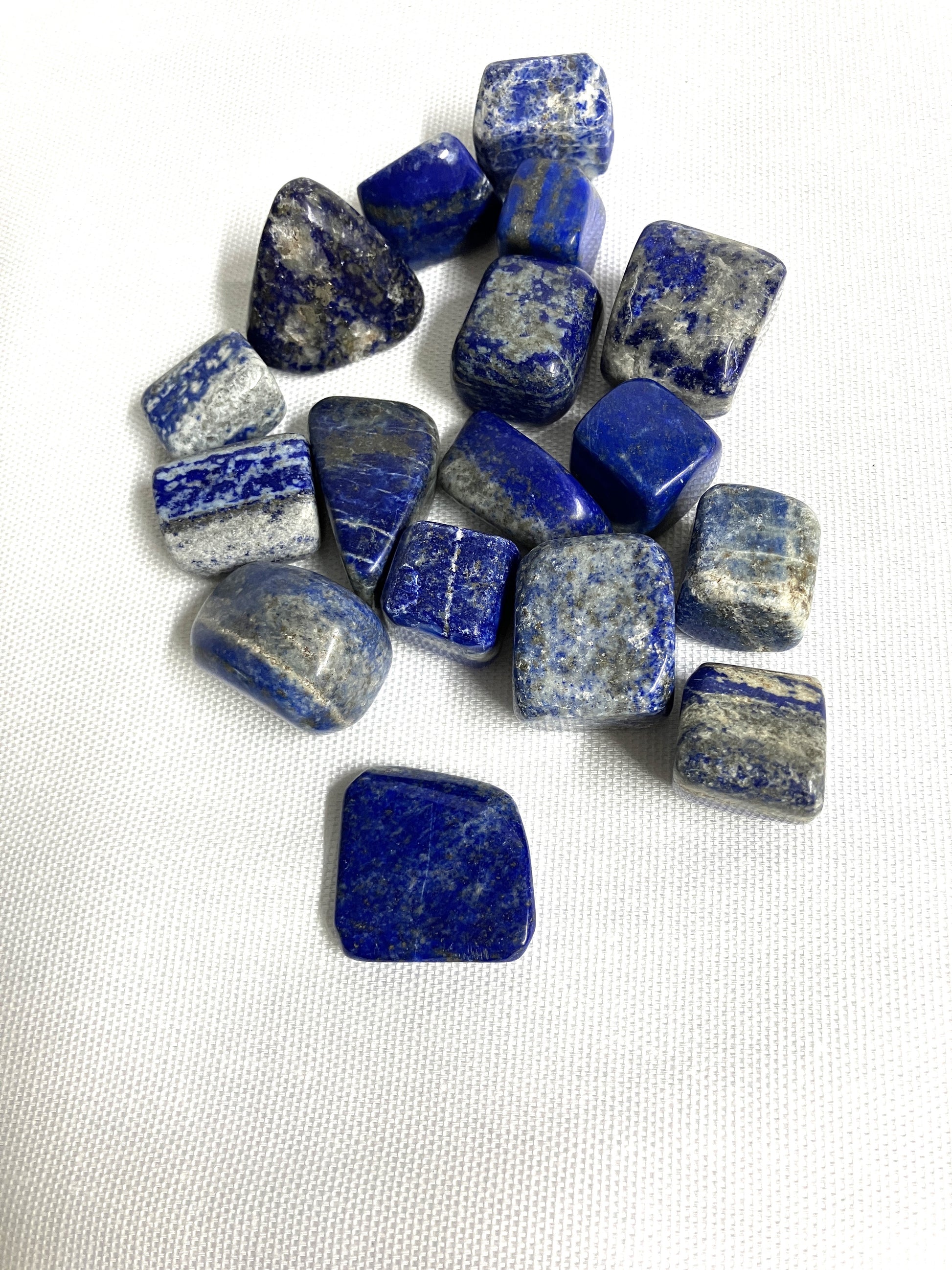 Front view of Lapis Lazuli Crystals on a white background