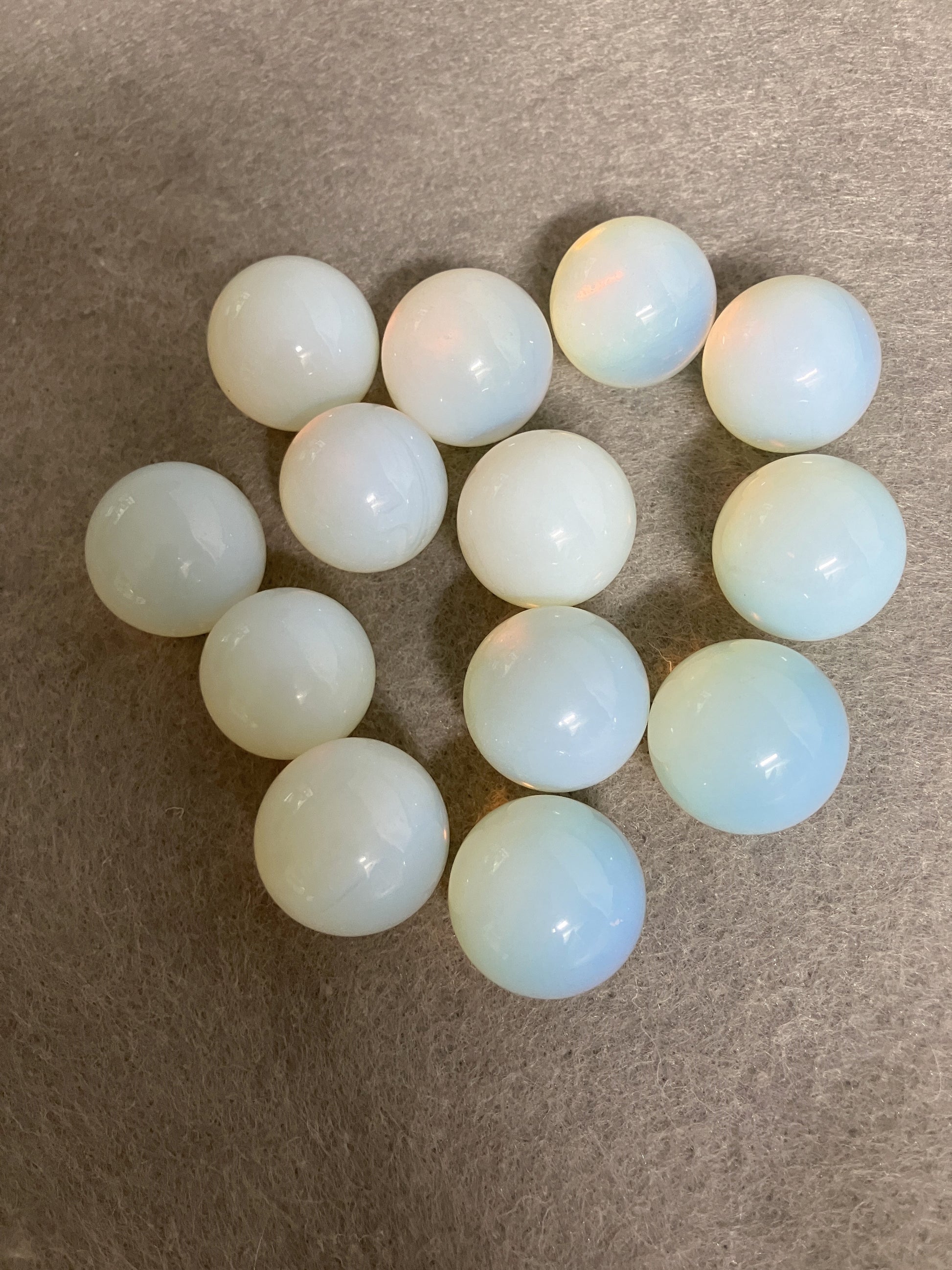 Beautiful  Opalite spheres on a brown background