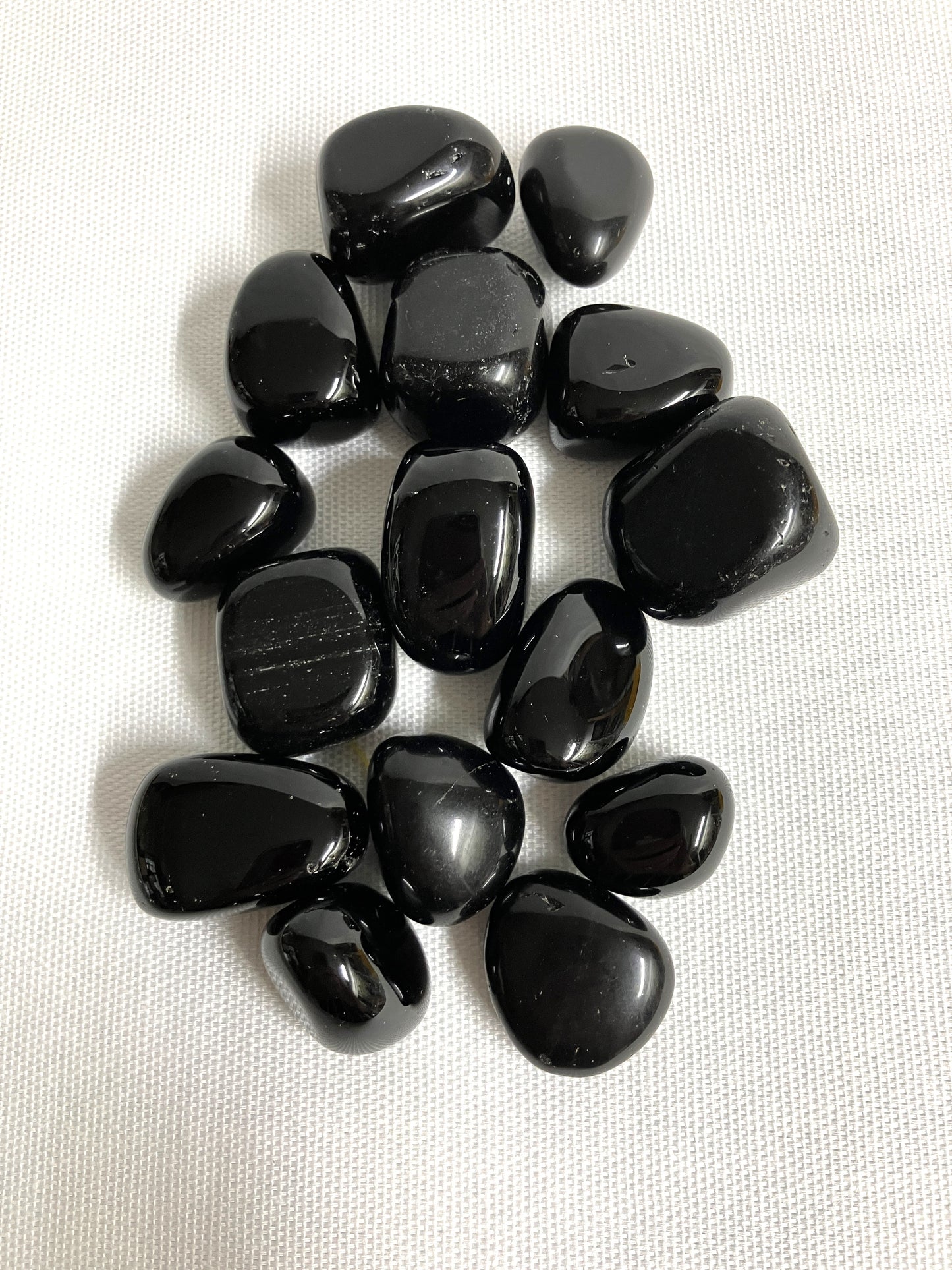 Top view of Black Obsidian Crystals on a white background