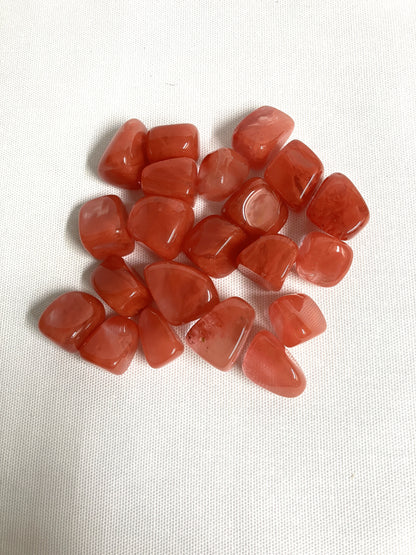 Back view of Cherry Quartz Crystals on a white fabric background