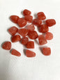 Front view of Cherry Quartz Crystals on a white fabric background