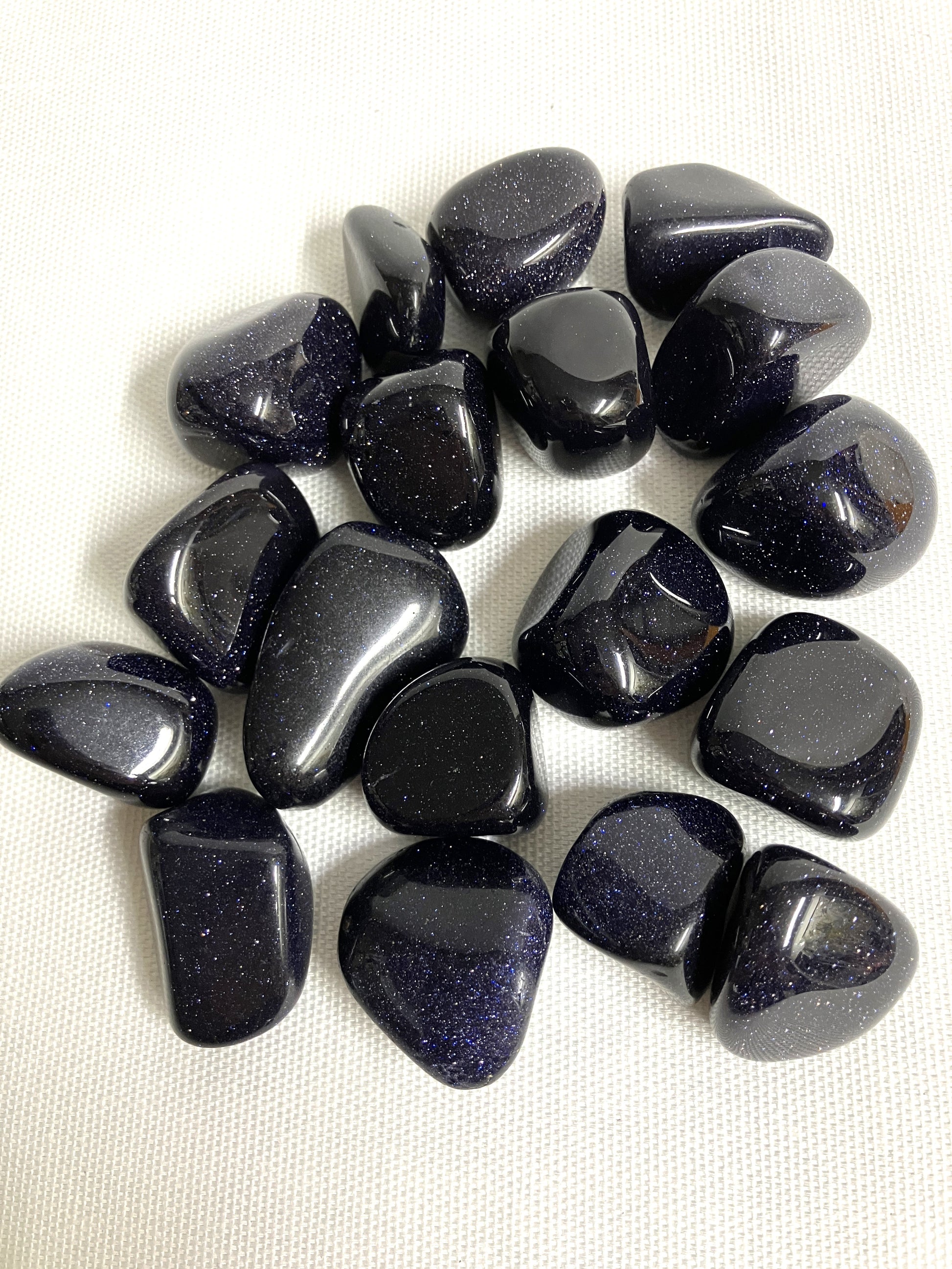 Group of Blue Goldstone Crystals on a white background
