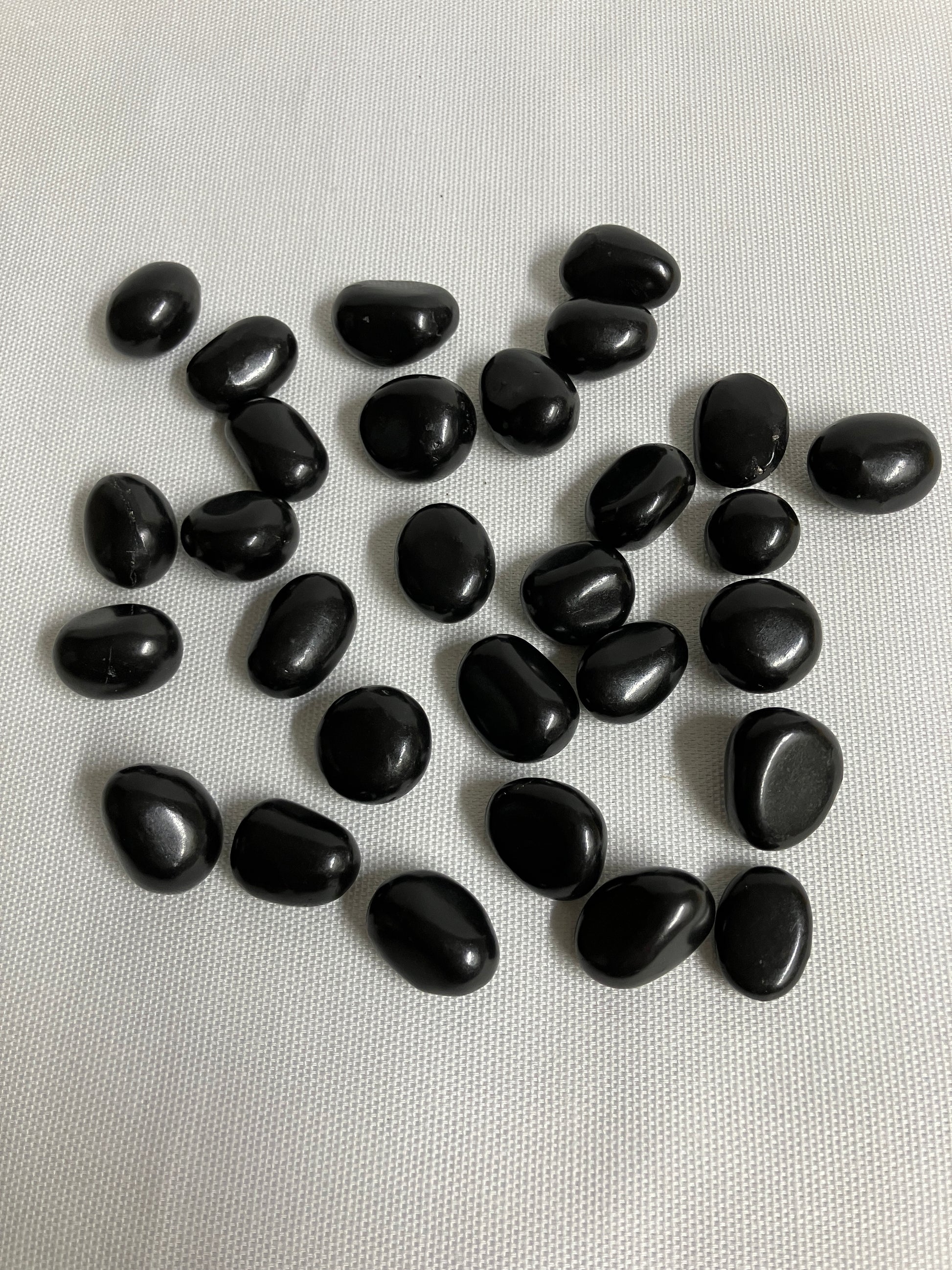 Front view of Shungite Crystals  on a light gray background