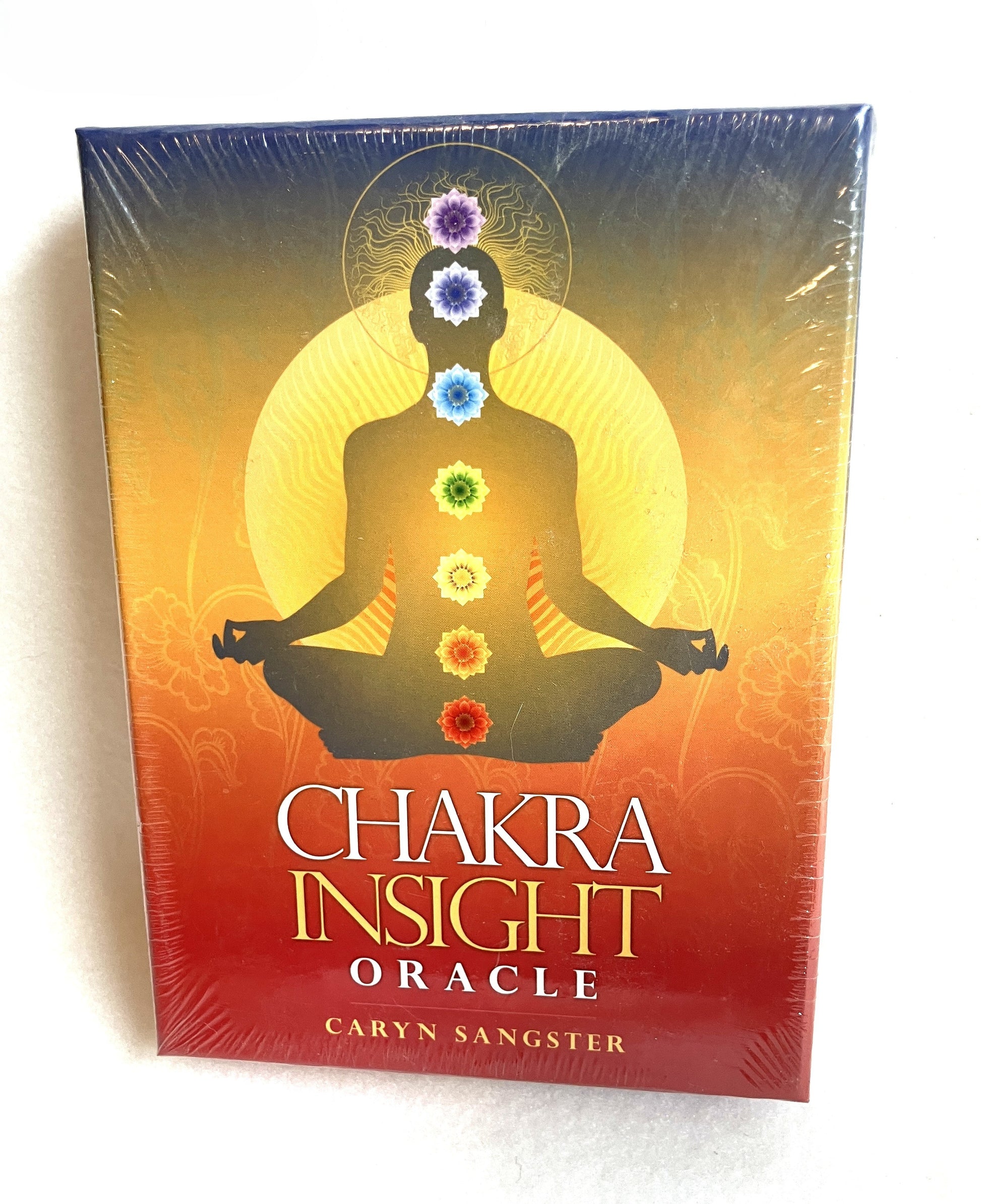 Chakra Insight Oracle card box with a colorful design on a white background