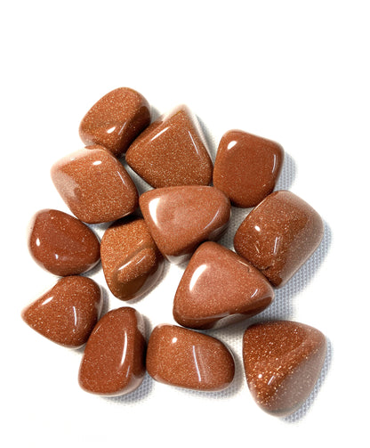 Red Goldstone Crystals Back on a white background