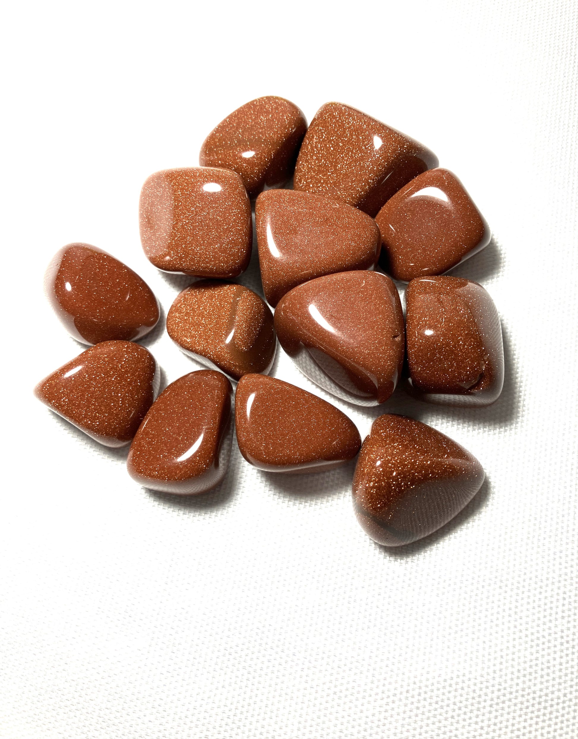 Red Goldstone Crystals Front on a white background