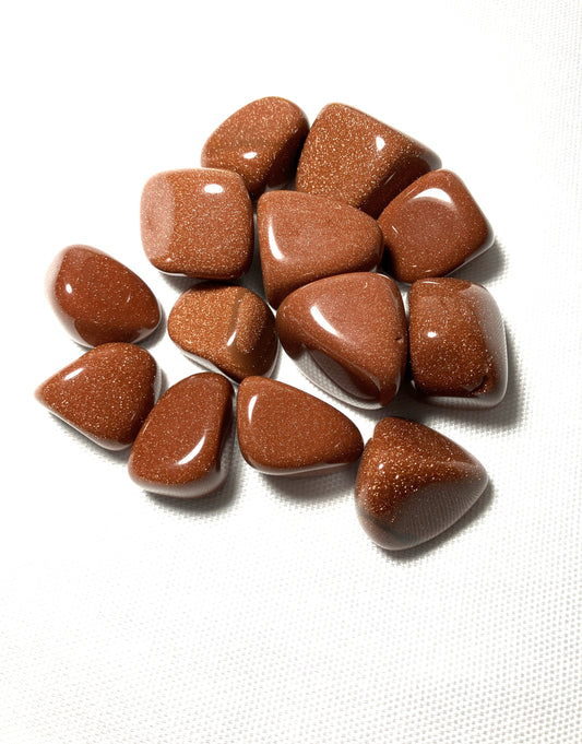 Red Goldstone Crystals Front on a white background