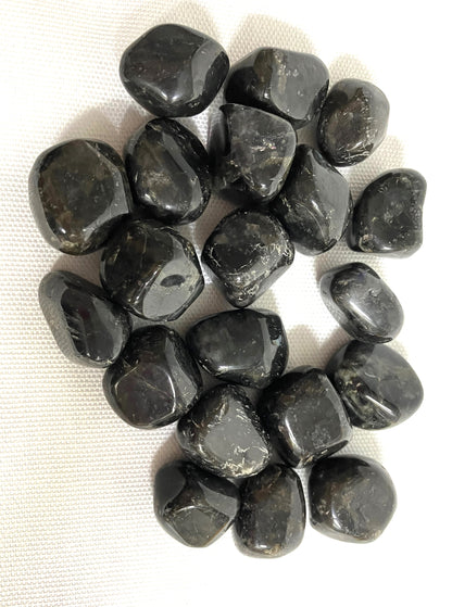 Back view of Larvikite Crystals on a white fabric background