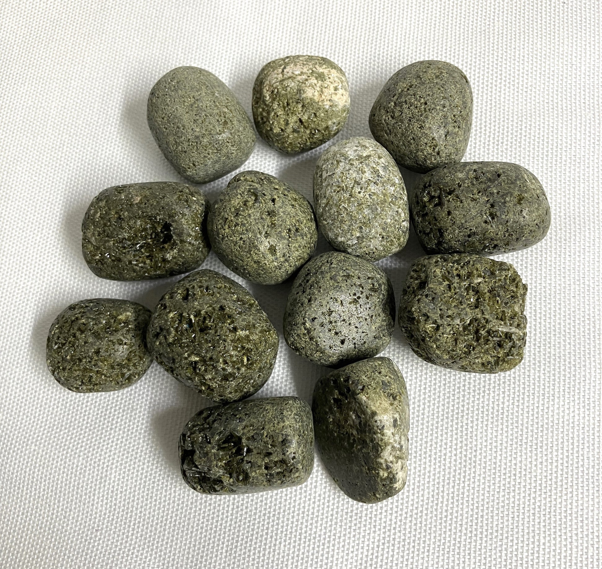 Grouping of rough tumbled Epidote healing stones
