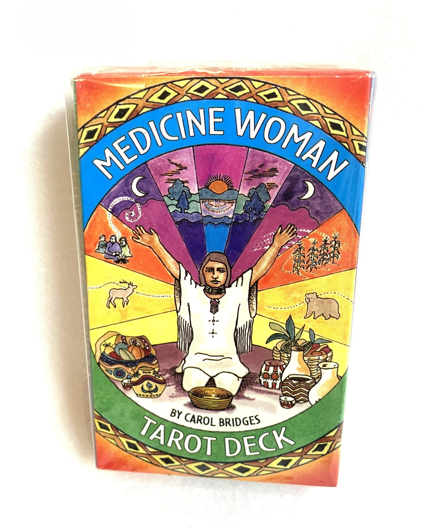 Tarot deck cover titled 'Medicine Woman' by Carol Bridges with colorful design and central figure.