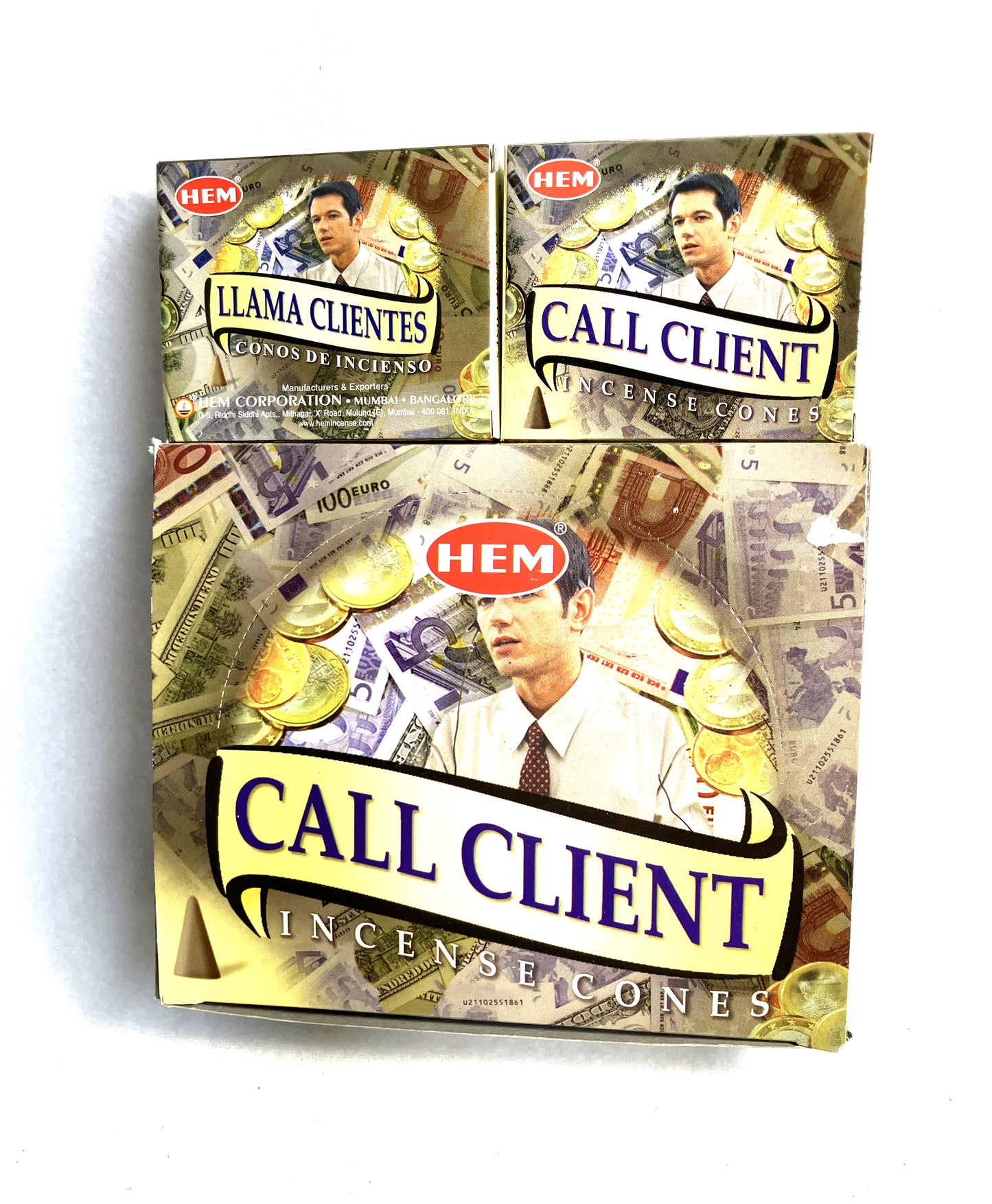 Master carton and two boxes of HEM Call Client Incense Cones shown on a white background