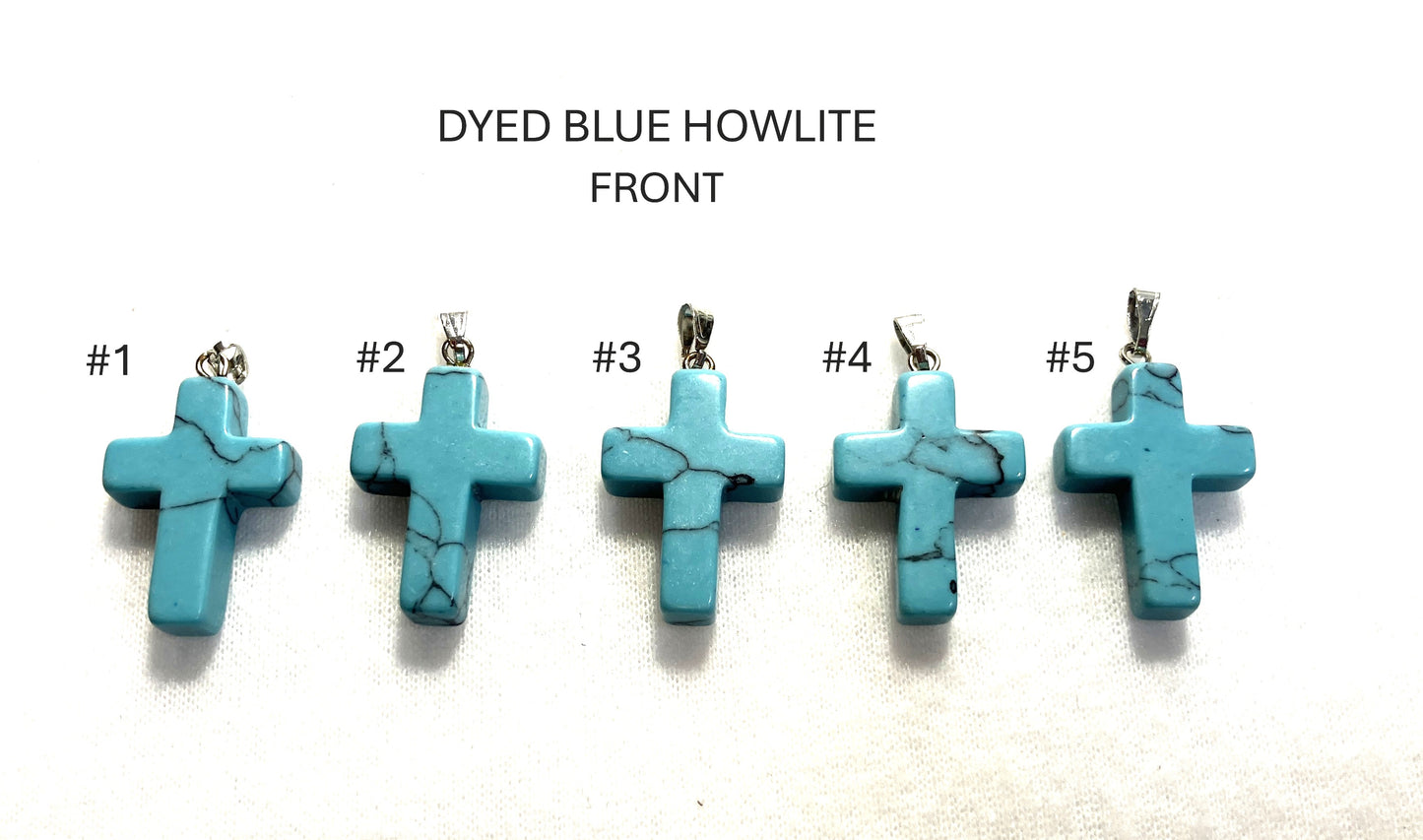 Five Dyed Blue Howlite Cross pendants labeled #1 to #5 shown on a white background.