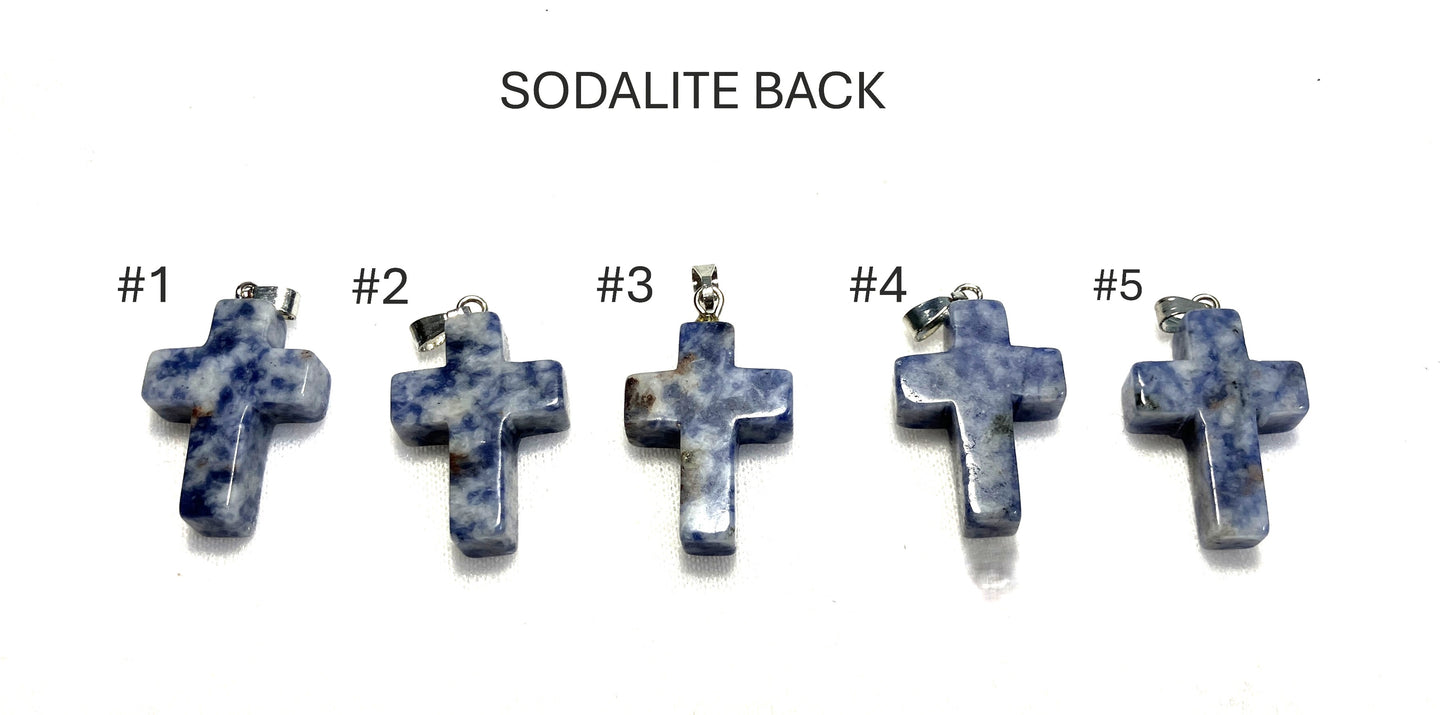 Back view of five sodalite cross pendants labeled #1 to #5 on a white background.