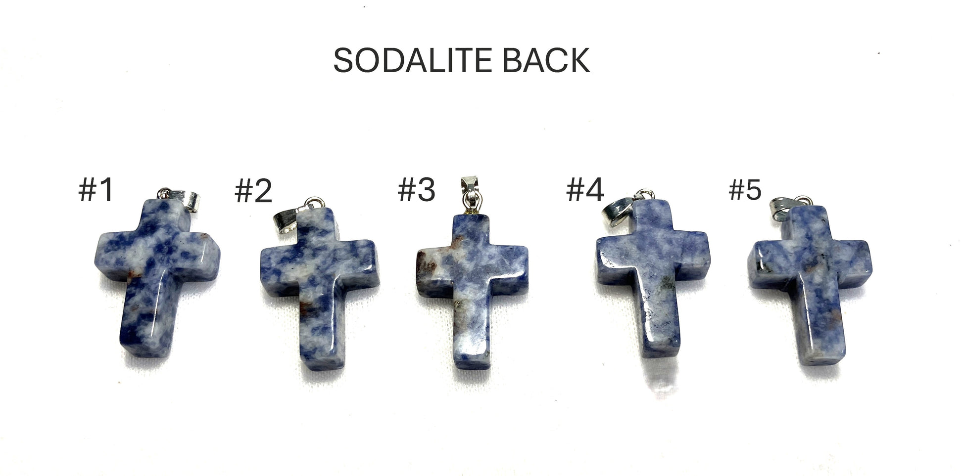 Back view of five sodalite cross pendants labeled #1 to #5 on a white background.
