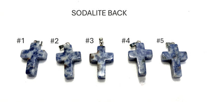 Back view of five sodalite cross pendants labeled #1 to #5 on a white background.