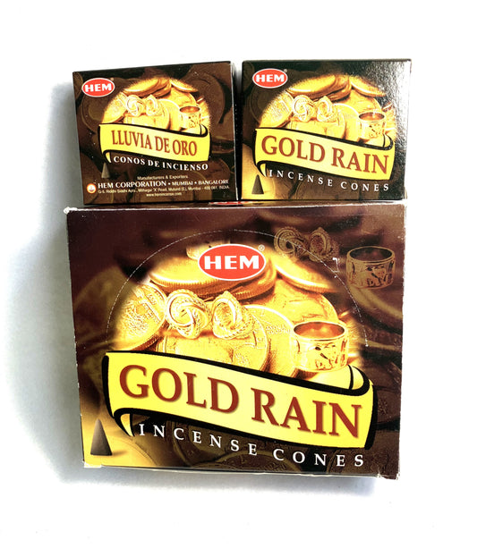 Master carton and two boxes of HEM Gold Rain incense cones shown on a white background