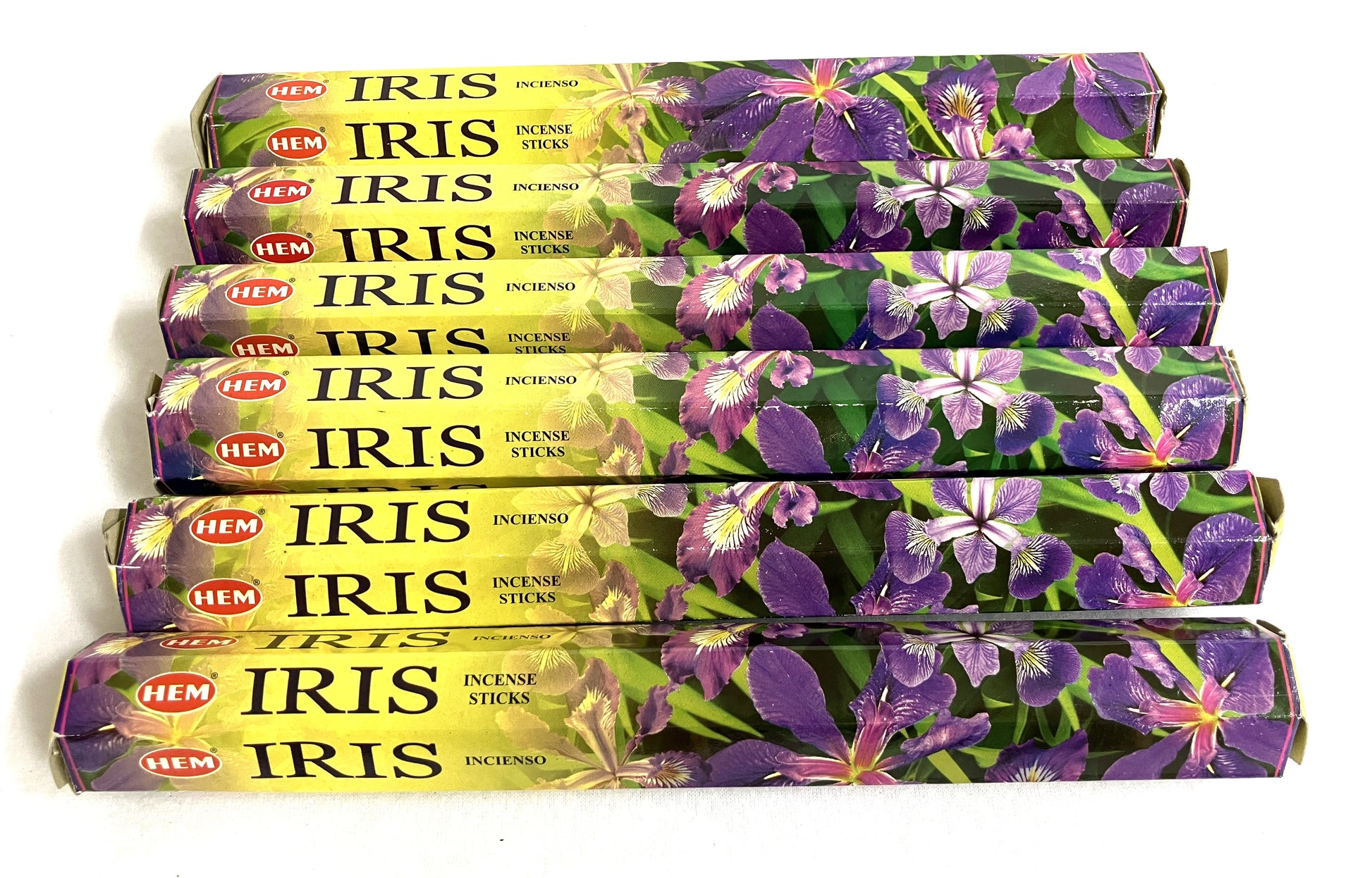 Multiple packages of HEM Iris incense sticks on a white background