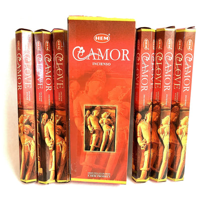Pack of HEM Amor Incense sticks with red and gold packaging.