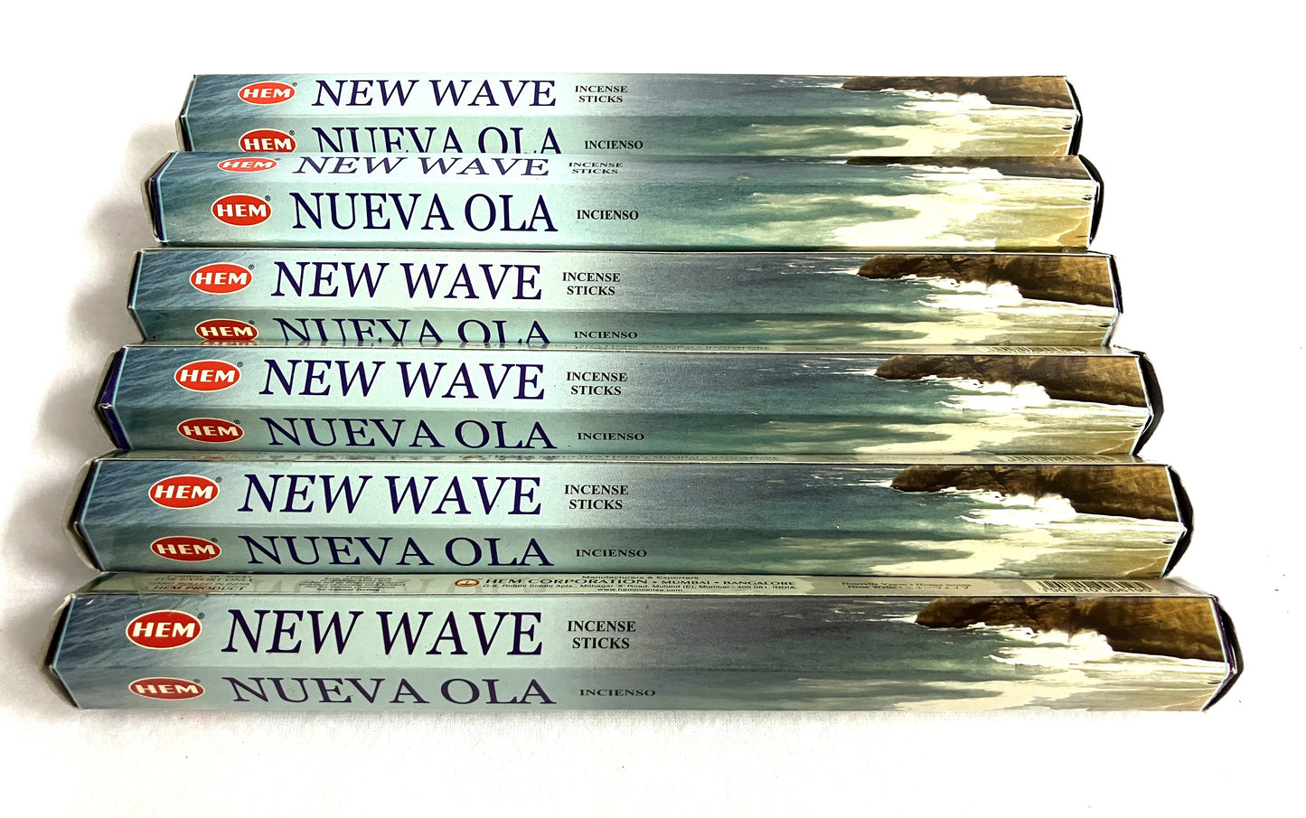 Multiple packages of HEM New Wave Nueva Ola incense sticks on a white background